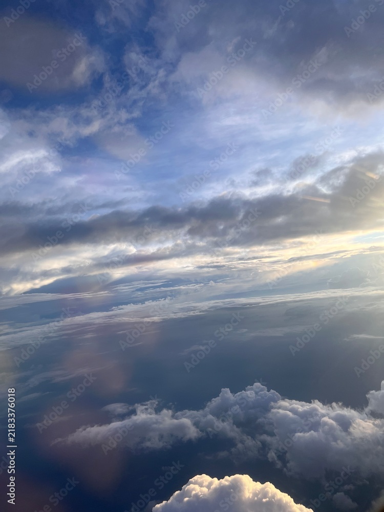 Obraz premium clouds over the sky (looking from the airplane)