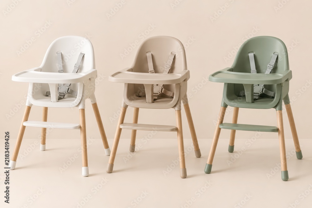 Obraz premium Three Modern Baby High Chairs in Neutral Colors