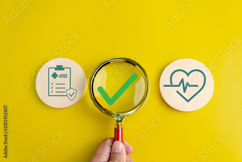 Canvastavla Healthcare verification concept with a magnifying glass checking a medical docum