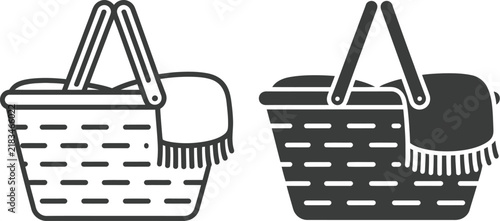 Bild auf Leinwand Picnic basket icon featuring woven basketry and blanket design in black and white vector illustration on transparent background
