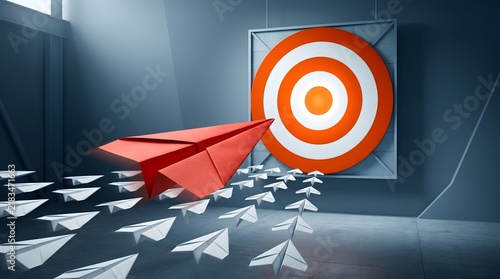 Bright red paper airplane leading a fleet of small white planes toward a large circular orange dartboard target symbolising success