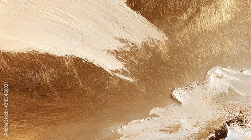 Abstract backdrop combining textured metallic gold paper and wide organic white brushstrokes with fine golden and brown flecks, frayed painterly edges