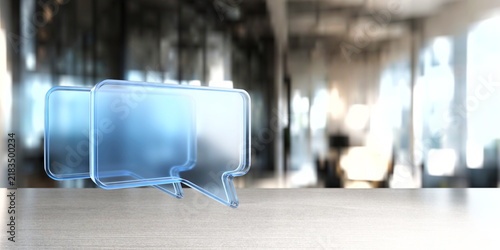 Transparent blue speech bubble icons on a blurred office background for communication banner and interface design