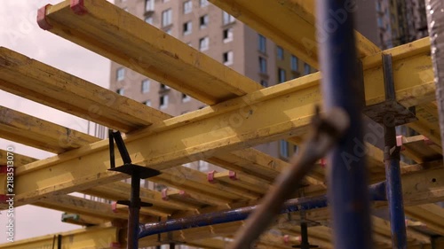 Timber formwork beams supporting concrete floor construction