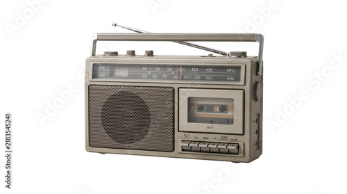 Vintage portable radio cassette player with antenna, tuning dial, speaker grille, and retro controls isolated on white background