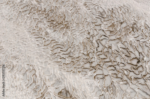 Abstract Travertine Mineral Patterns In Pamukkale Turkey Showcasing Natural Geological Formations Textures And Thermal Terrace Beauty