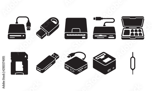 Set of black flat representing various computer hardware, data storage devices, usb flash drives, memory cards, and external hard drives on a white background