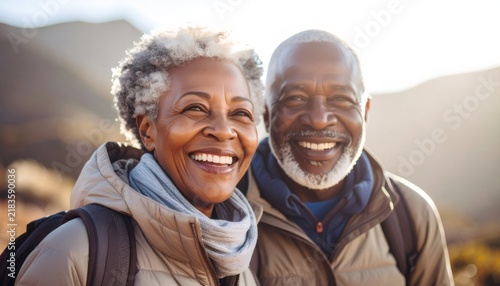 Active senior couple traveling smiling outdoors happily