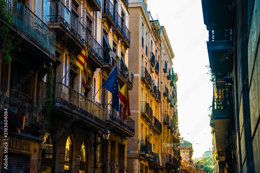 Fototapeta premium European Street Scene With Flags And Balconies
