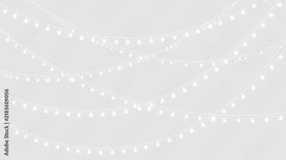 Obraz premium Hanging white fairy lights on transparent background. Draped string lights garland overlay. Festive holiday decoration element