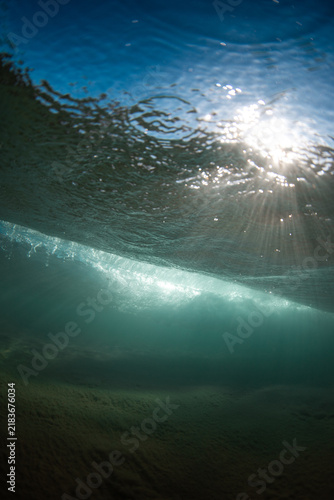 Photography Beautiful view of beneath the ocean surface with sunlight rays.