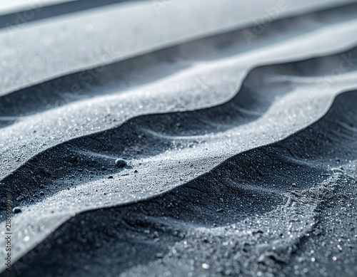 Grey Ash with Sparkling Texture Piled on Car Surface, Wave-Like Pattern