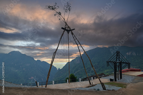 Giant Swing Construction and rope-tying details for the Akha swing-rocking ceremony during the New Year festival at Ban Pha Hi, Mae Sai, Chiang Rai, Thailand.