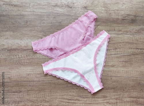 Women's lingerie, elegant cotton panties with lace trim in a flat lay composition, top view