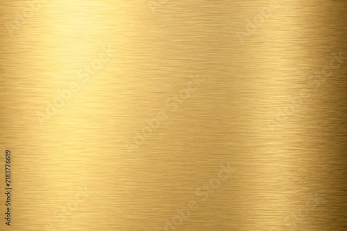 Shiny brushed gold metal texture background with horizontal light lines
