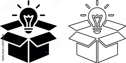 Foto Creative think outside the box concept with a glowing lightbulb emerging from an open cardboard box icon for innovative business