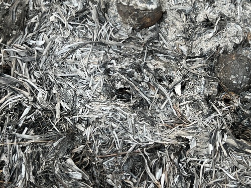 Fotografie Close up ash texture from burnt leaves dry grass and charred organic matter