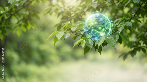 Holographic earth globe network connection on green leaves background for environmental tech.