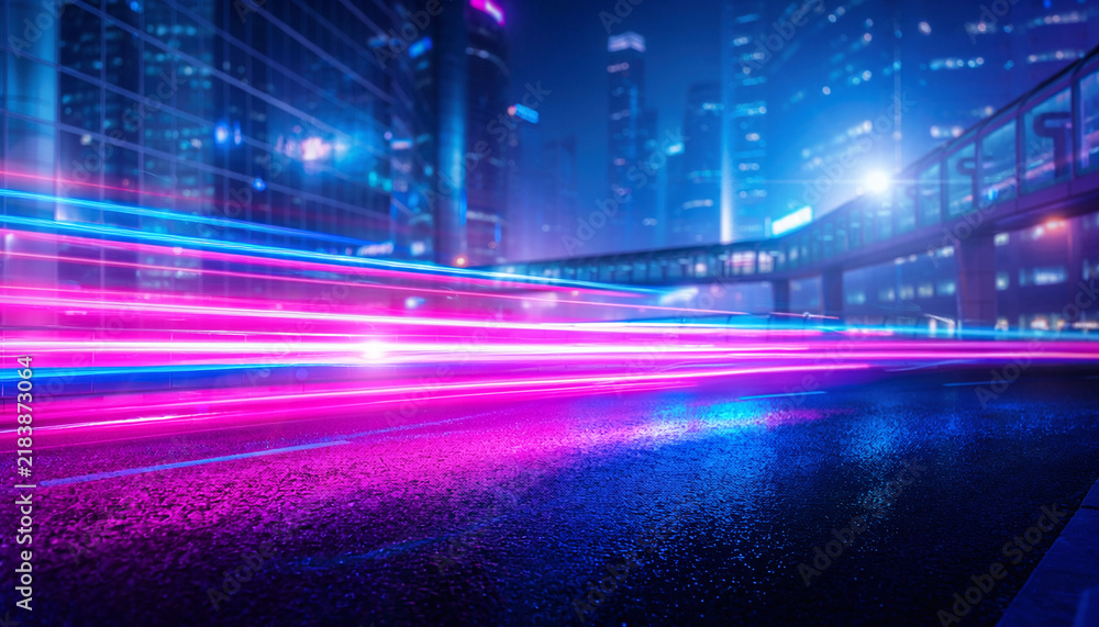 Obraz premium A futuristic city street at night featuring vibrant motion blur light trails in neon pink and blue. Nobody is present in this dynamic urban scene, conveying energy, speed, and modern technology.