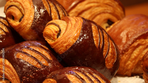 Freshly Baked Chocolate Pastries and Croissants in Bakery Display