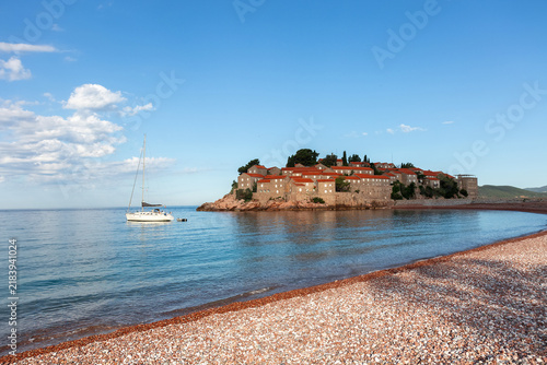 Old town on the island of Sveti Stefan is a famous landmark in Montenegro. Balkans.