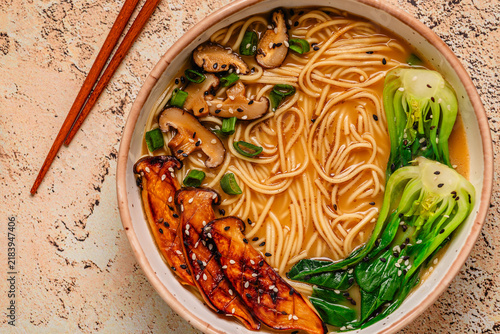 Bild auf Leinwand Vegan miso ramen noodle soup with eryngii and shiitake mushrooms, pak choi cabba