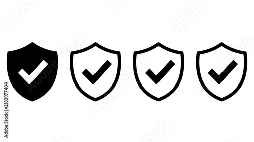 Set of black shield icons with check marks for security and safety concepts on a white background
