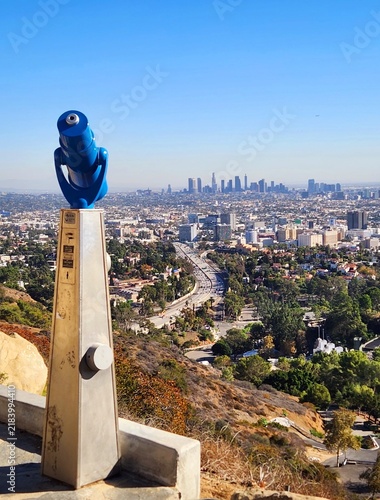 Canvas Print Coin operated telescope viewer on observation deck with panoramic city skyline v