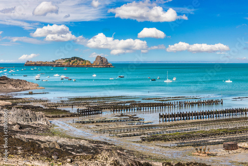 The oyster beds of Cancale in the Ille-et-Vilaine department of the Brittany region in France form a historic coastal site known for traditional oyster farming and wide tidal landscapes.