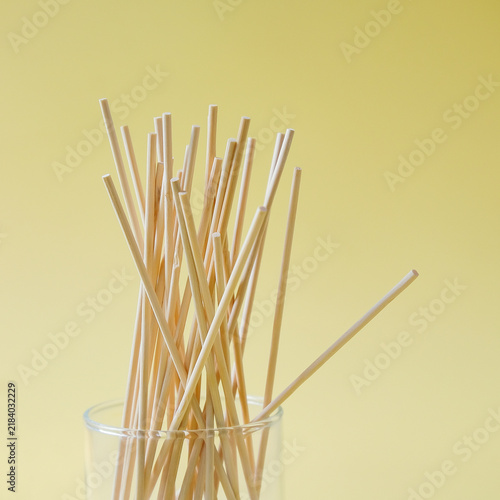 A Bamboo Skewers wood sticks on a color background.