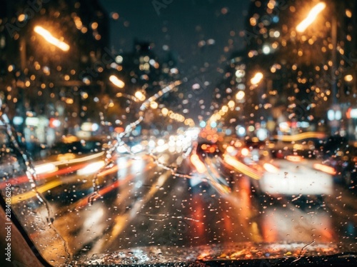 Rainy Night City Street Lights Streaking From Inside Car View