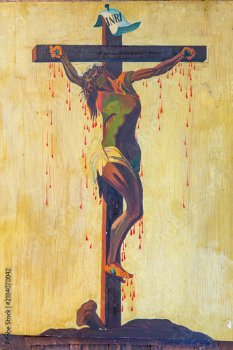 Konstfotografi A religious painting depicts Jesus Christ crucified on the cross with the INRI sign above