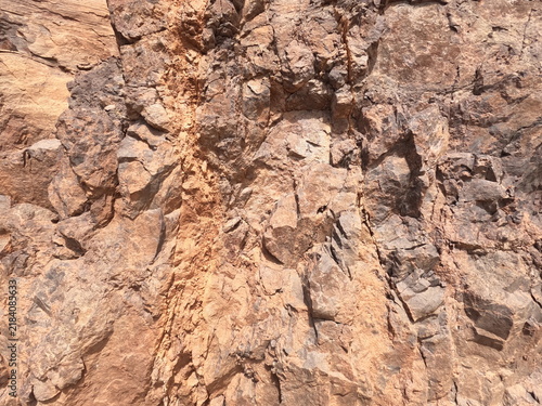 Rough, fractured mountain stone texture from civil engineering roadwork
