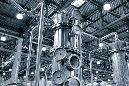 фотографія Stainless steel towers dominate the factory interior
