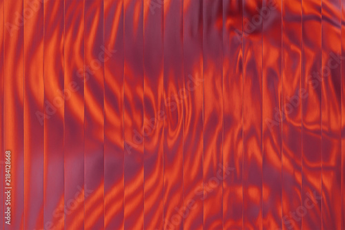 Fotografía Red and orange undulating vertical panels create a textured abstract background