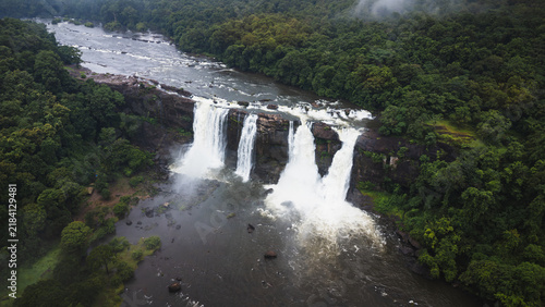 Photography Wide aerial landscape of Athirappilly Waterfalls during the rainy season