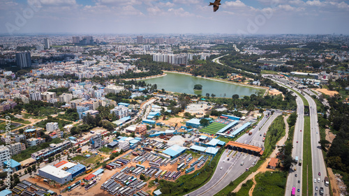 Photography Aerial view of Bangalore city with roads and urban development