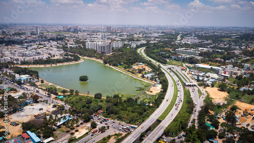 Photography Aerial view of Bangalore lake, roads and surrounding urban development