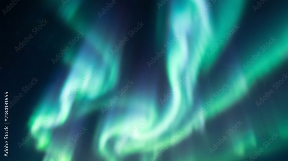 Naklejka premium Green aurora borealis dancing across a dark night sky with borealis northern phenomenon astronomy luminous ethereal