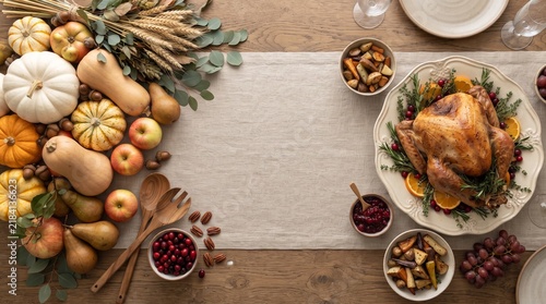 Thanksgiving dinner table with roasted turkey