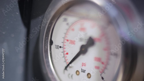 Analog pressure gauge showing pressure reading
