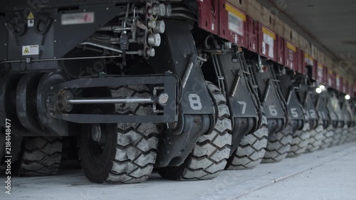Self propelled modular transporter for moving extremely heavy loads