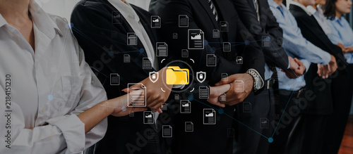 Foto Diverse Business Professionals Collaborating with Digital File Icons Representing Teamwork and Data Management in Modern Workplace Environment