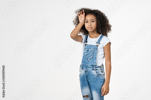Canvastavla Cute African American girl looking tired and exhausted isolated on white backgro