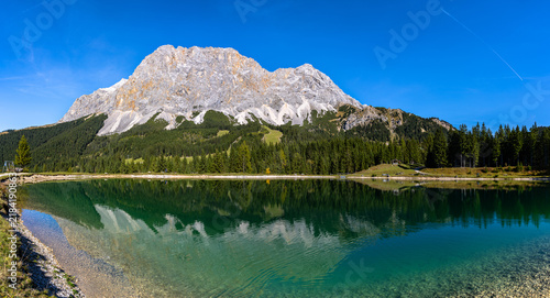 фотографія Stunning panorama view of Almsee lake in Ehrwald with Zugspitze massif in backgr