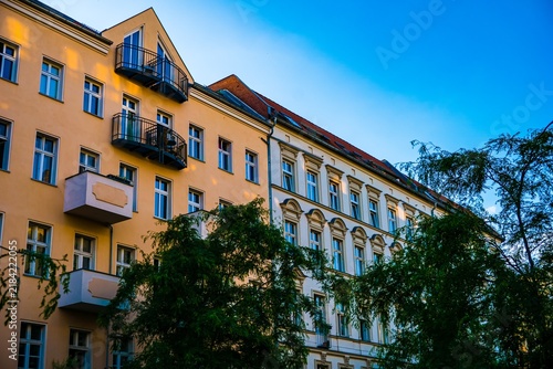 Residential Building With Balconies And Trees