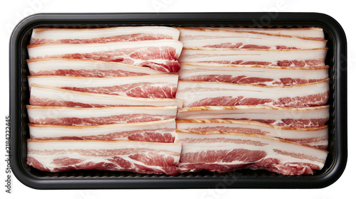 Cuadro en lienzo Isolated raw fresh streaky bacon slices neatly arranged in a black plastic tray,