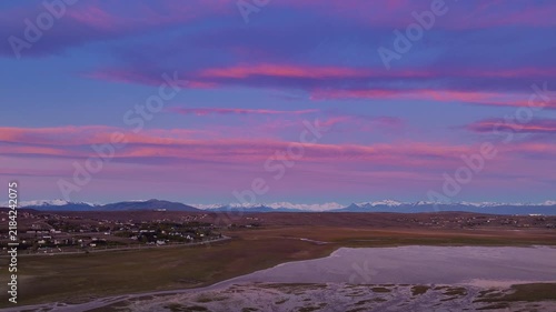 Aerial panorama of El Calafate Argentina at sunrise with the snow-capped Andes m
