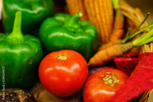 Fresh vegetables and colorful produce in a basket at a local market