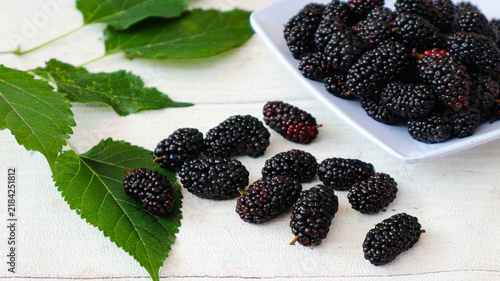 Canvastavla Fresh mulberries (Morus alba), locally known as murbei, are often mistaken for blackberries